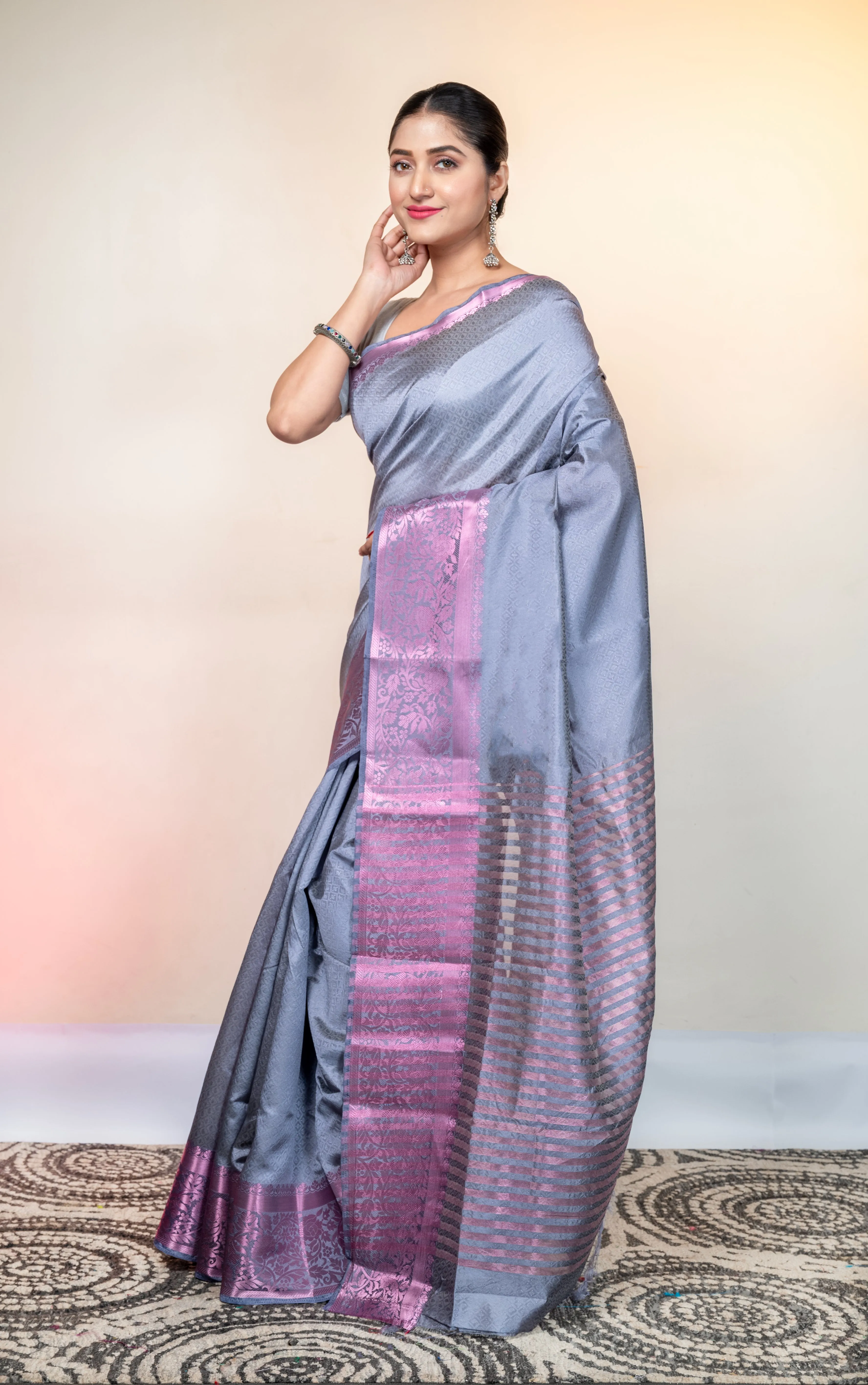 Women Grey Kanjivaram Soft Silk Saree With Pink Stripe Pallu And Woven Motifs