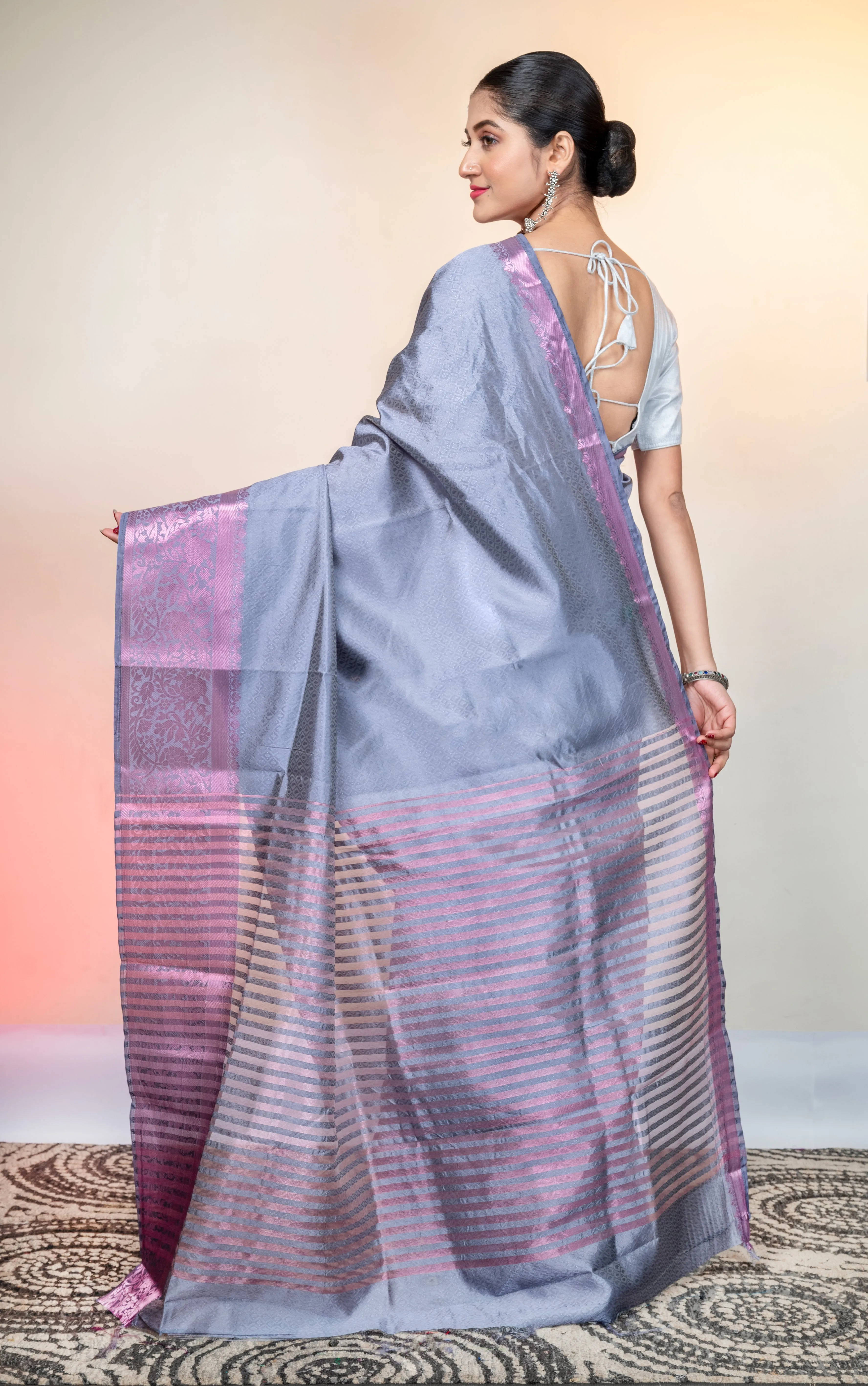 Women Grey Kanjivaram Soft Silk Saree With Pink Stripe Pallu And Woven Motifs