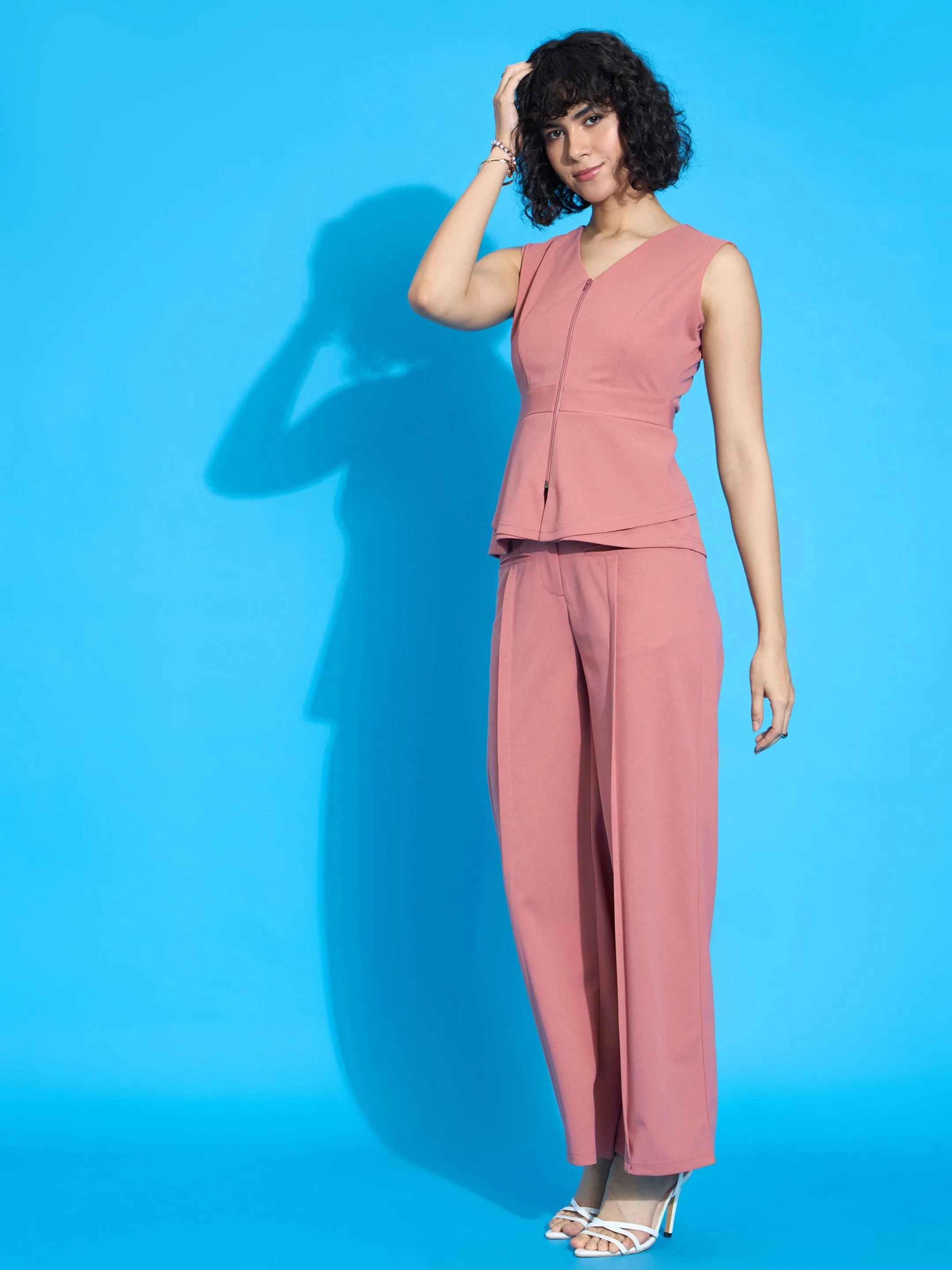 Women Peach Sleeveless Zipper Peplum Top With Straight Fit Trousers